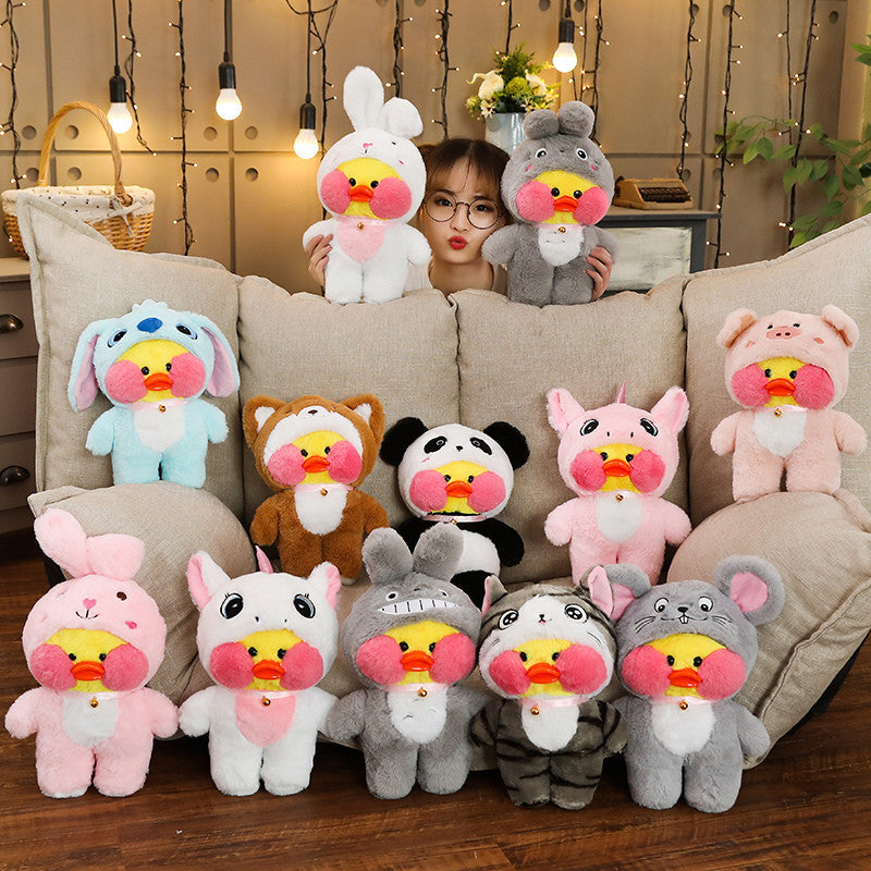 Canard Kawaii avec des jouets en peluche de poupée de costume d'animaux mignons