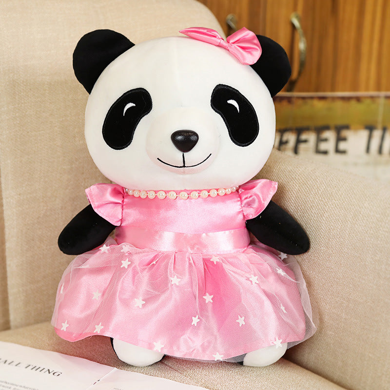 Kawaii portant des jouets en peluche mignons de poupée de panda de jupe