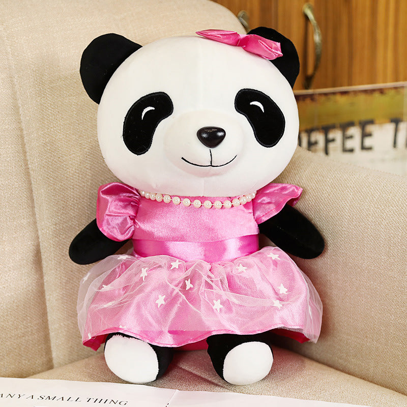 Kawaii portant des jouets en peluche mignons de poupée de panda de jupe